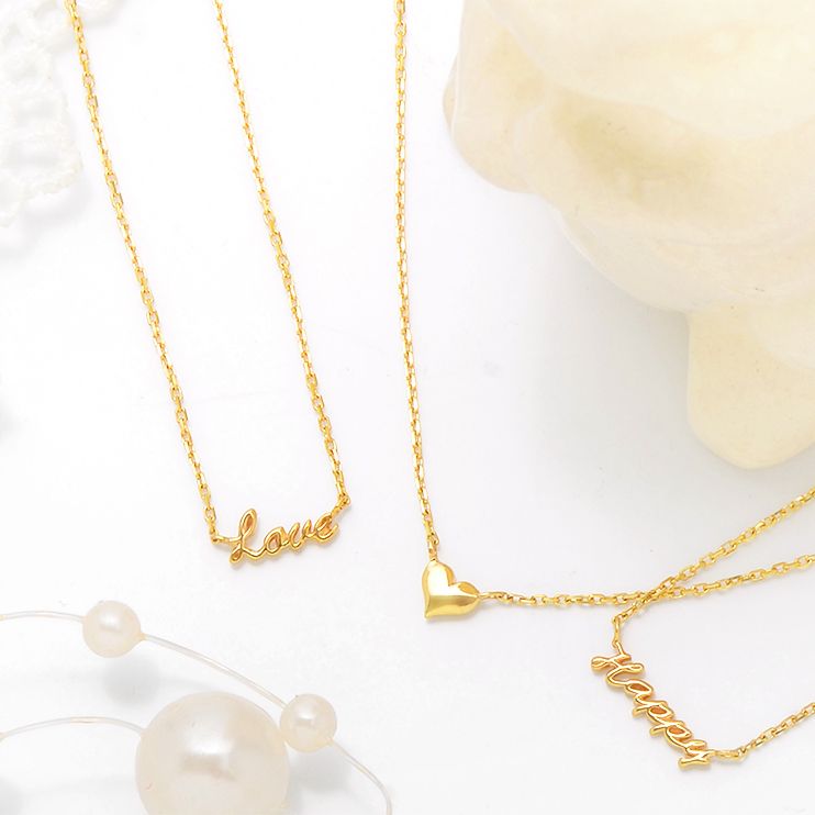 成功・繁栄に導くゴールドネックレス幸運のモチーフで運気を味方に